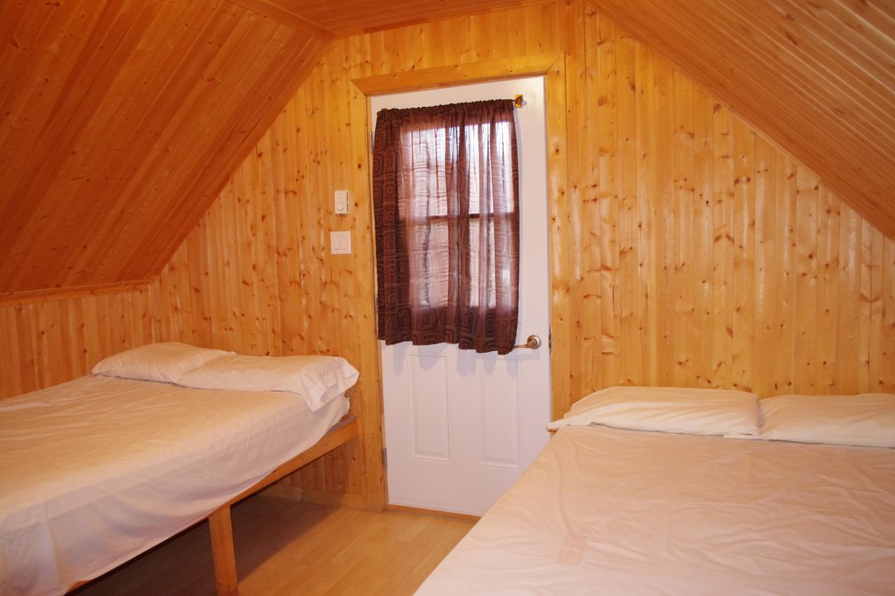 Club Tadoussac Villa Bagian luar foto